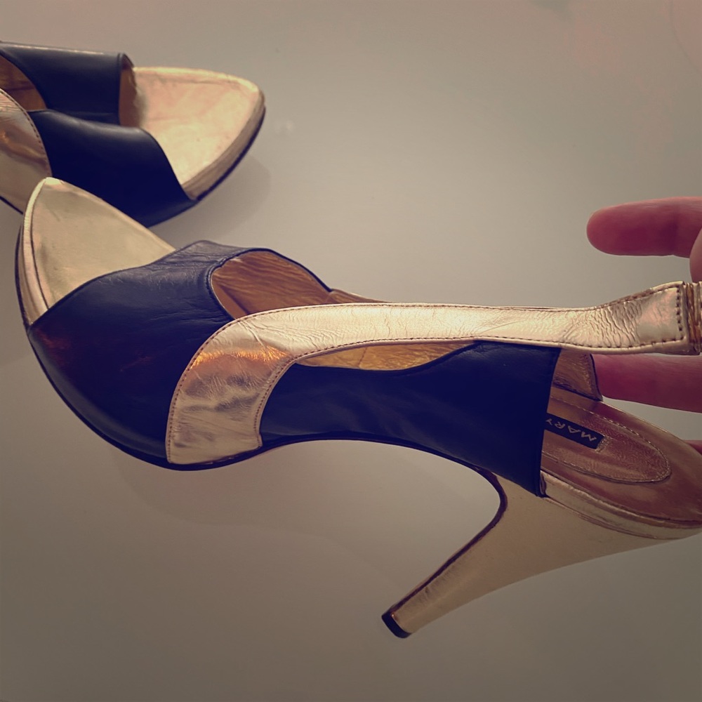 Black and gold heel